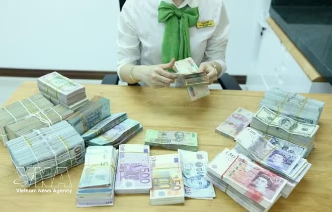 Reference exchange rate drops 3 VND on April 15